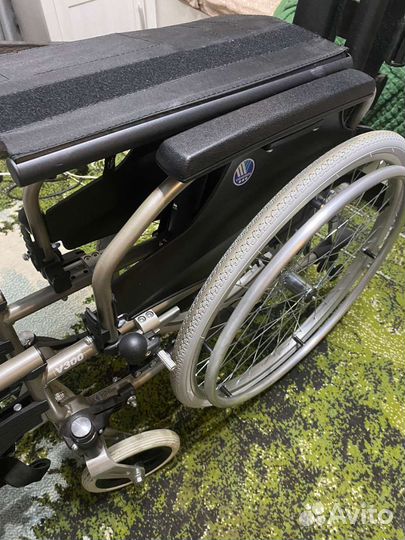 Инвалидная коляска