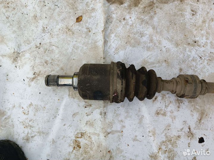 Приводной вал левый Мицубиси Лансер 9 МКПП