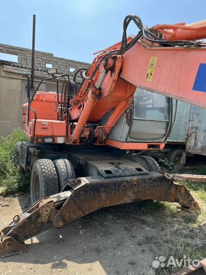 Колёсный экскаватор Hitachi EX165W, 2002