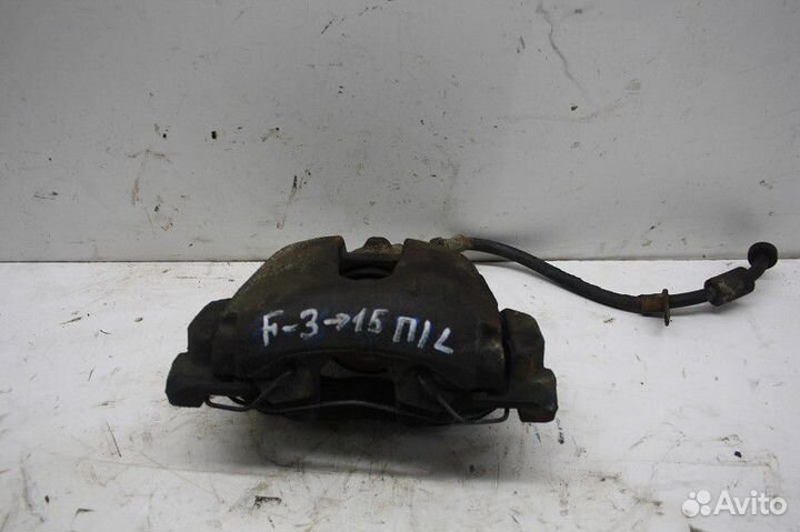 Суппорт передний левый Ford Focus III (2011—2015)