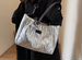 Модная женская сумка серебряная дутая