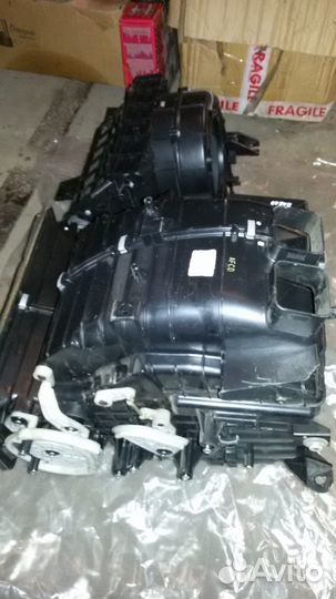 Хендай элантра XD корпус отопителя