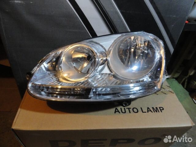 Jetta 05 Фара левая с регулировочным мотором (Depo)