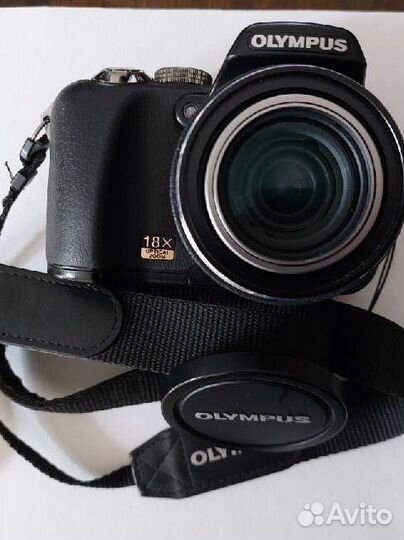 Зеркальный фотоаппарат Olympus sp-560uz