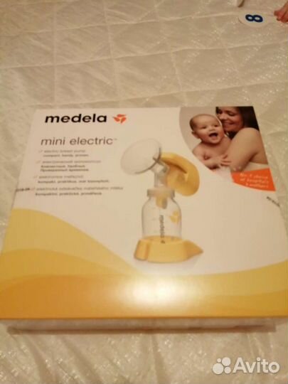 Молокоотсос medela электрический