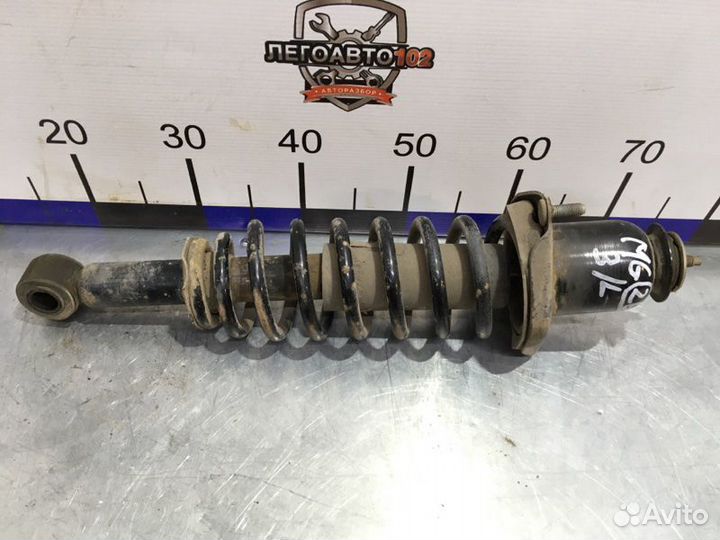 Стойка подвески задняя левая Geely Emgrand Ec7