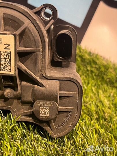 Моторчик стояночного тормоза заднего левого