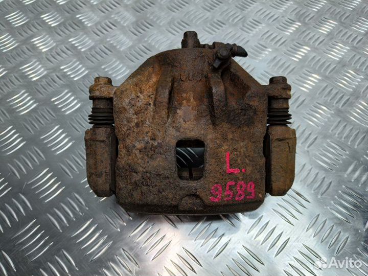 Суппорт тормозной передний левый Hyundai Tucson