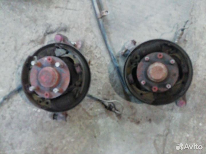 Кулак задний киа спектра