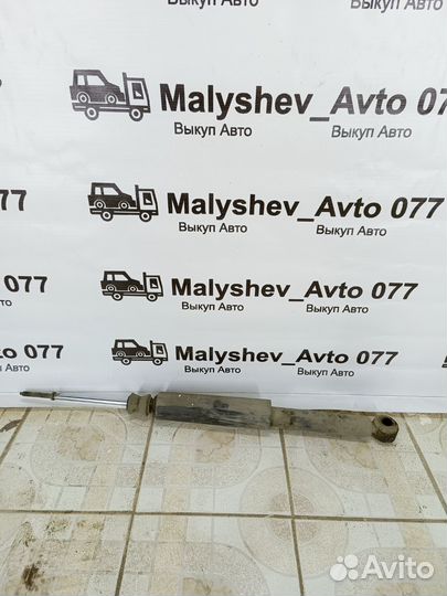 Стойка амортизатора задняя Geely Mk седан