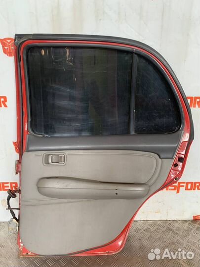 Обшивка двери задняя правая Ниссан Марч К11