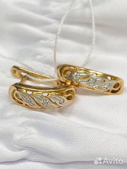 Золотые серьги с камнем