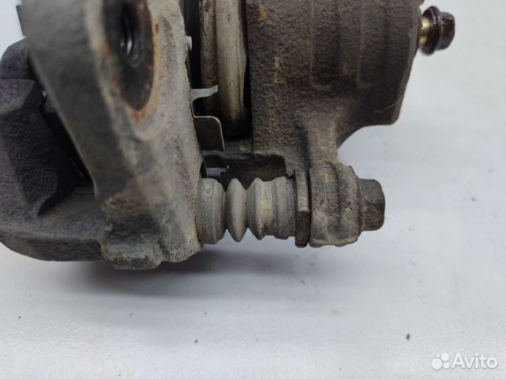 Суппорт тормозной левый Nissan Lucino N15 1995 г