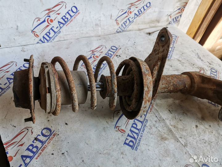 Стойка амортизатора переднего левого Daewoo Nexia