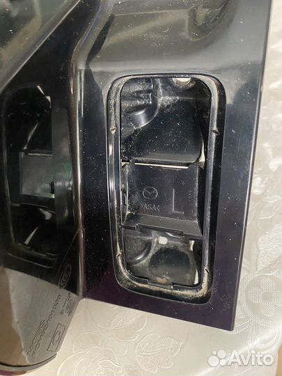 Фонарь задний mazda 9сx левый