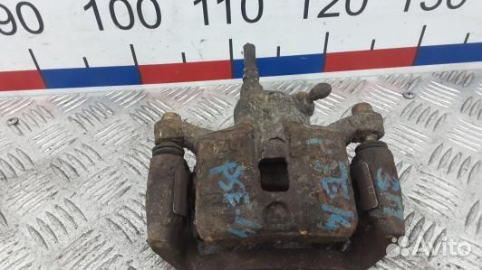 Суппорт тормозной задний левый mitsubishi galant 8