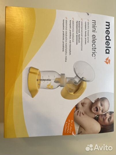 Молокоотсос medela электрический