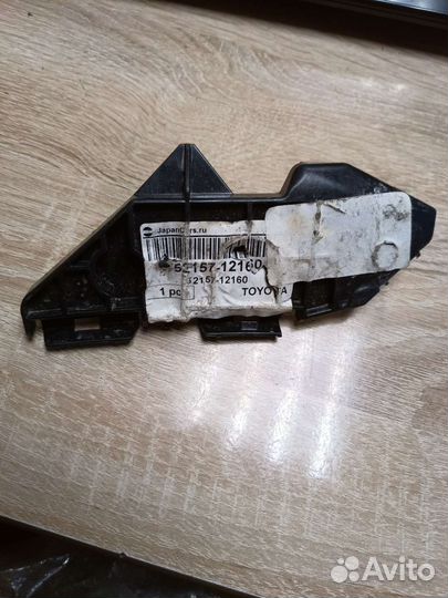 Кронштейн бампера задний правый Toyota Corolla 120