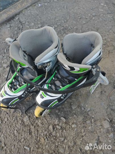 Роликовые коньки