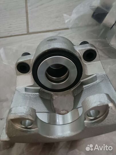 Суппорт тормозной Додж караван 3,3