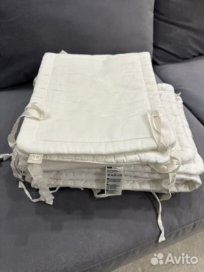 Бортики в кроватку stokke