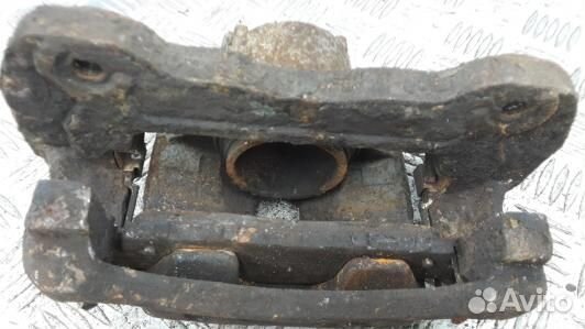 Суппорт тормозной передний правый mitsubishi L200