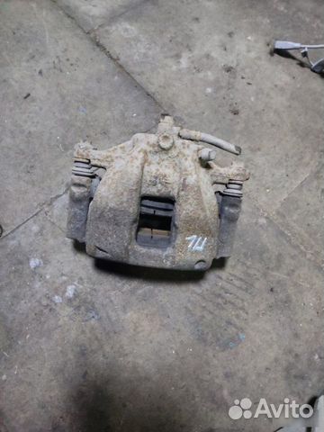 Суппорт тормозной передний левый Honda Cr-V 3