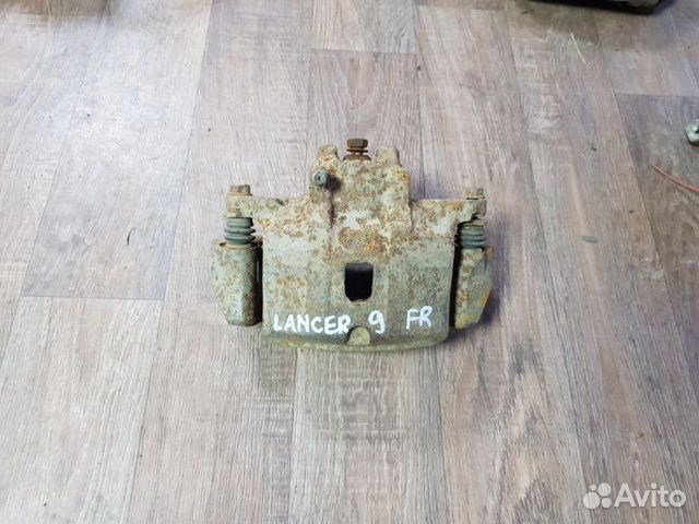 Суппорт тормозной передний правый Mitsubishi