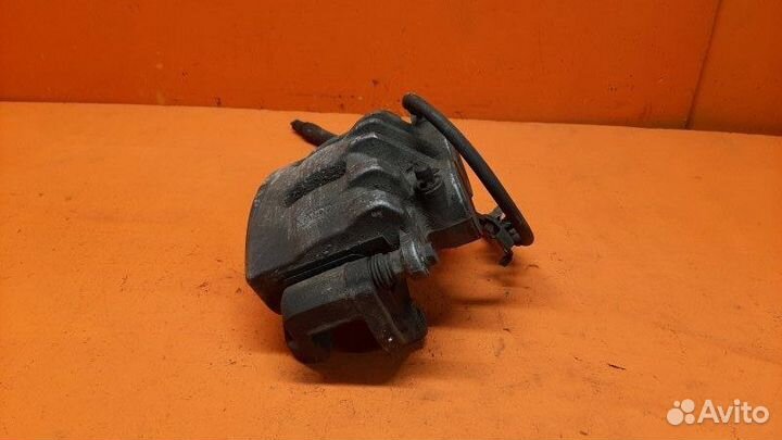 Суппорт тормозной передний левый Cadillac Cts 2009