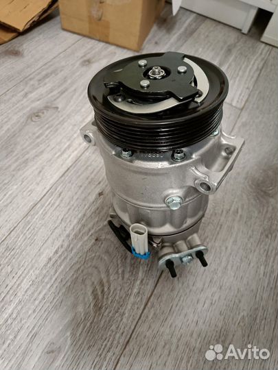 Компрессор кондиционера Opel Insignia