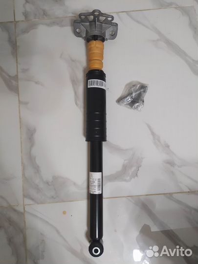 Амортизатор подвески левый на Opel Corsa D