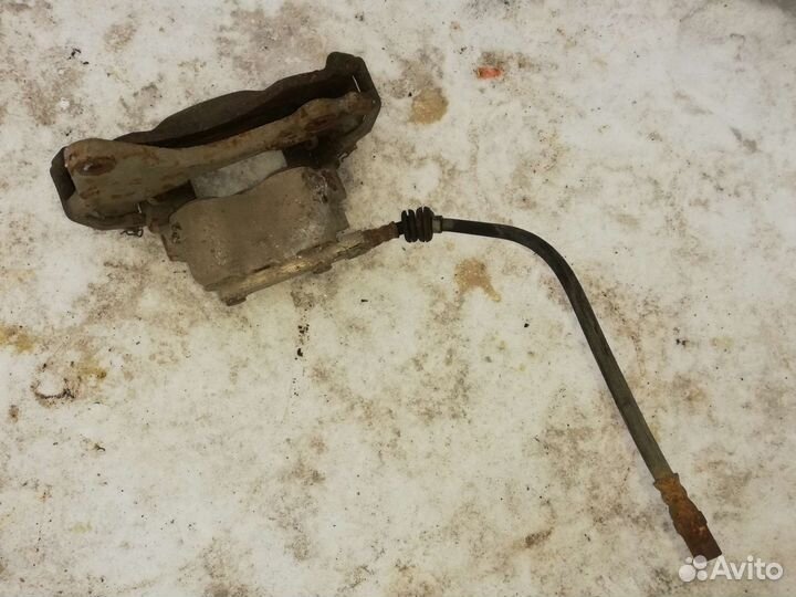 Суппорт тормозной передний Нива Шевроле