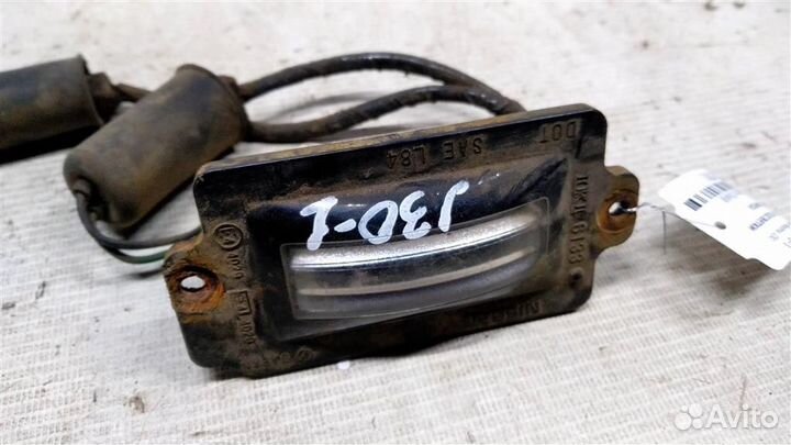 Фонарь подсветки номера Nissan Maxima J30