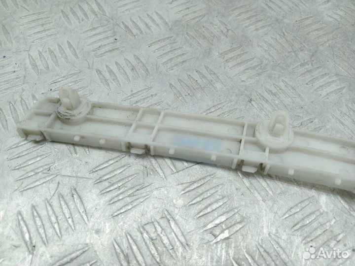 Кронштейн заднего бампера правый Mitsubishi Lancer