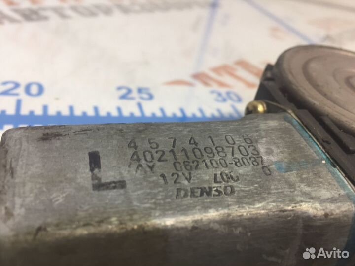 Моторчик стеклоподъемника передней левой двери