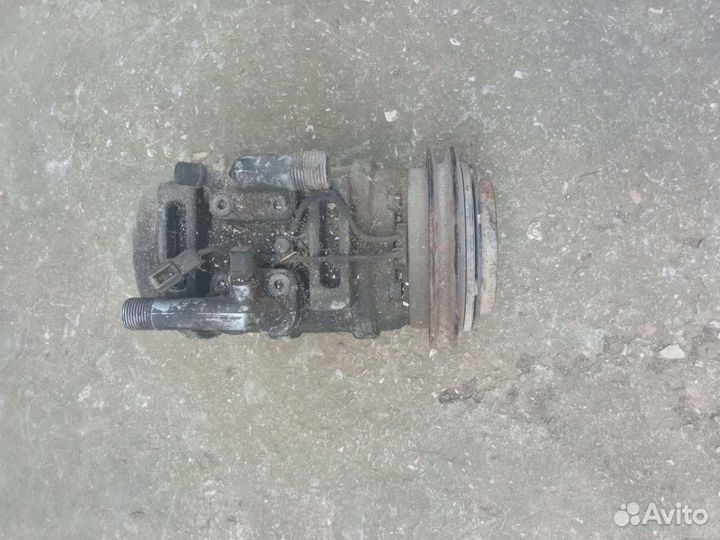 Компрессор кондиционера нисан