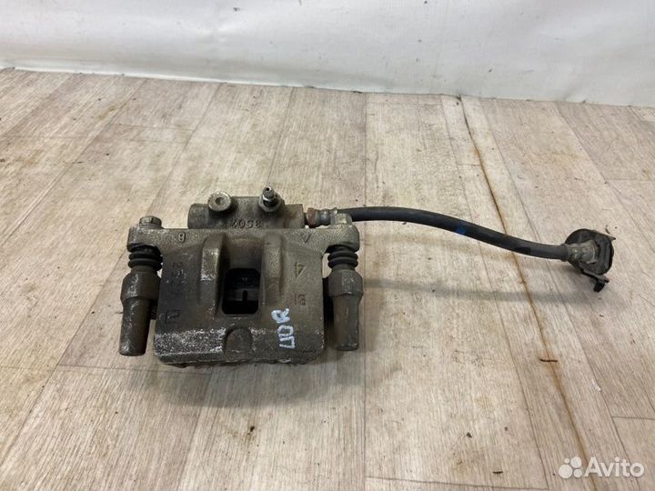 Суппорт задний правый Mitsubishi Lancer 10 CY3A