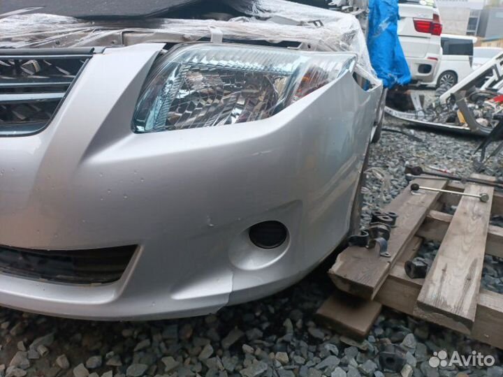 Бампер передний Toyota Corolla Fielder NZE144