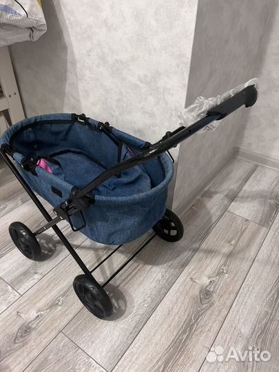 Детская игрушечная коляска