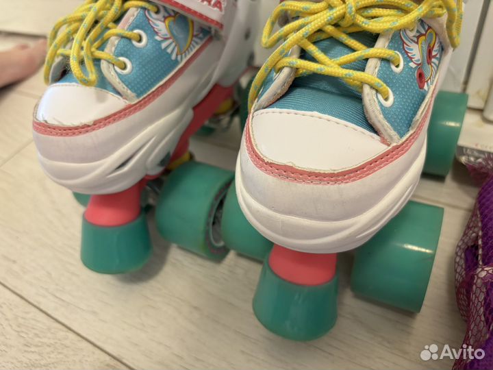 Ролики квадры раздвижные 28-31