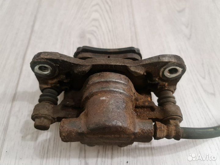 Суппорт задний правый Mitsubishi Lancer 10 CX3A