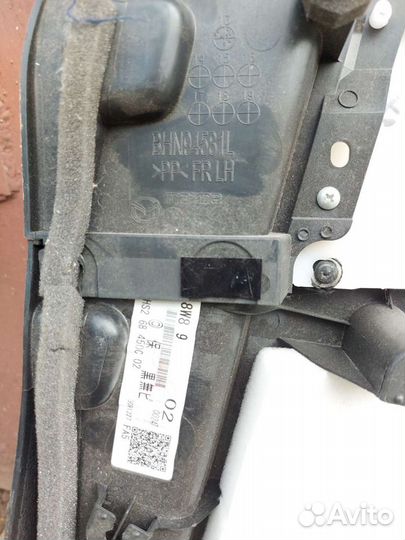 Обшивка двери Mazda 3