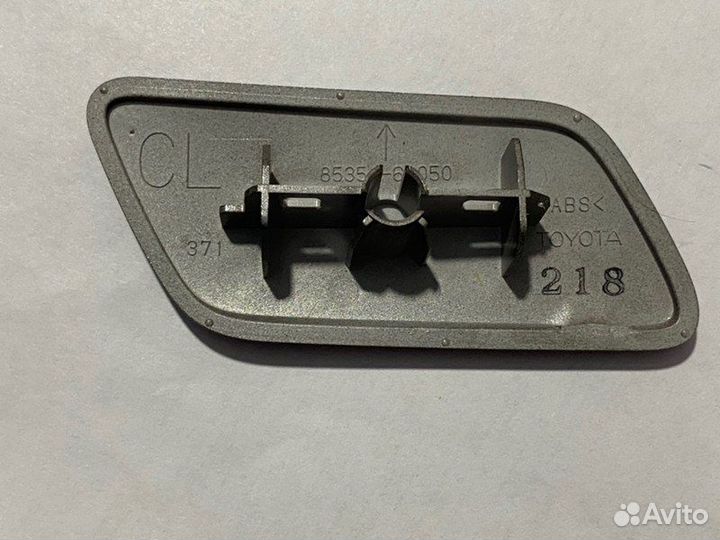 Крышка омывателя фары передняя левая Toyota Land