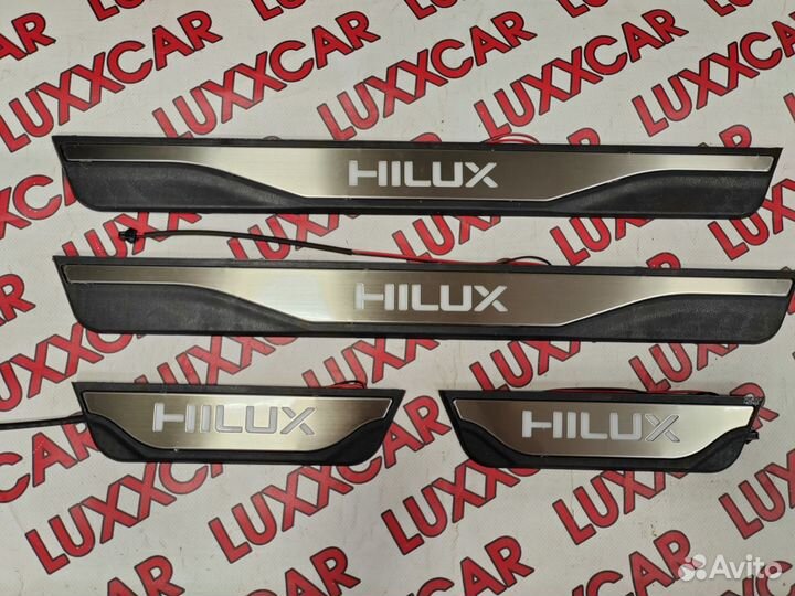 Накладки на пороги с подсветкой (LED) Hilux 15-23г