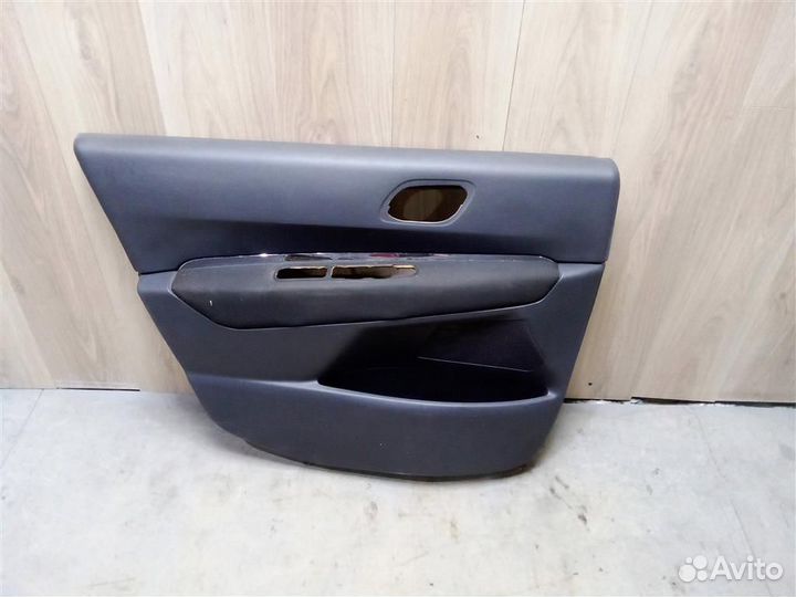 Обшивка двери передней левой от Peugeot 3008 2010