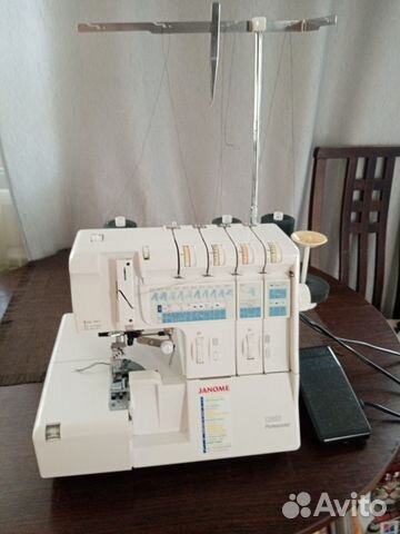 Коверлок Janome 1200D