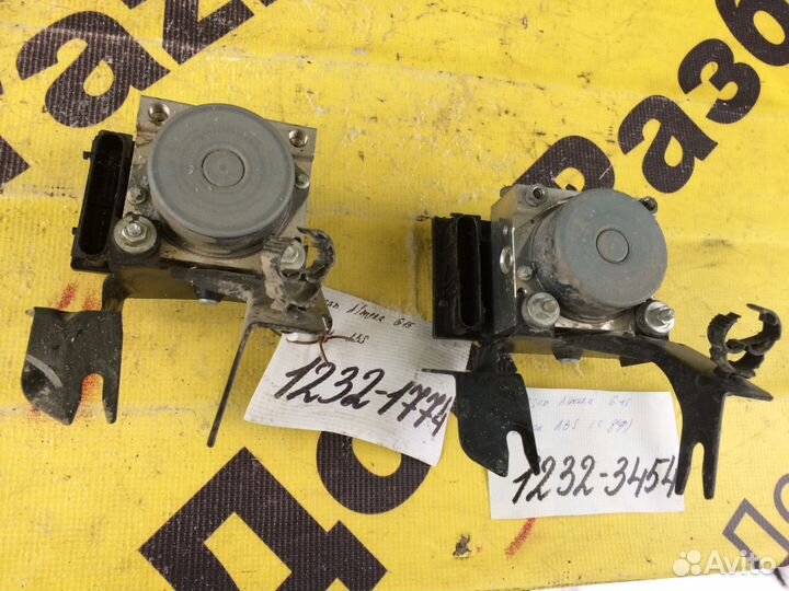 Блок ABS Nissan Almera G15