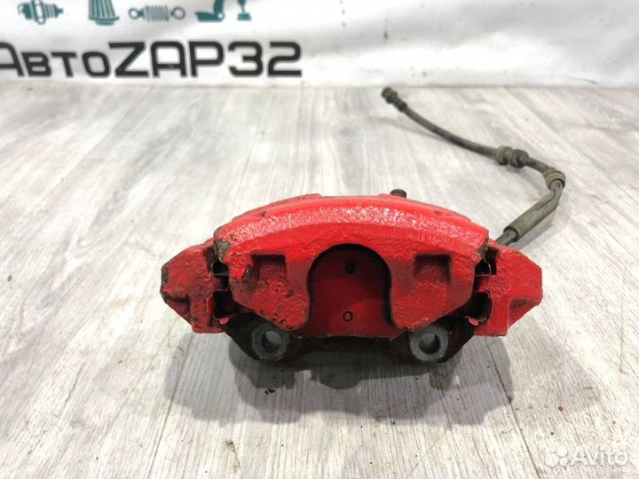 Суппорт тормозной передний левый Volkswagen Polo 5