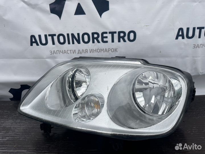 Фара левая Volkswagen Kaddy