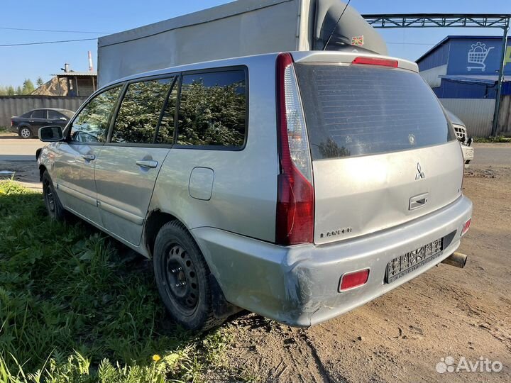 Mitsubishi lancer 9 универсал задние стекла глухие